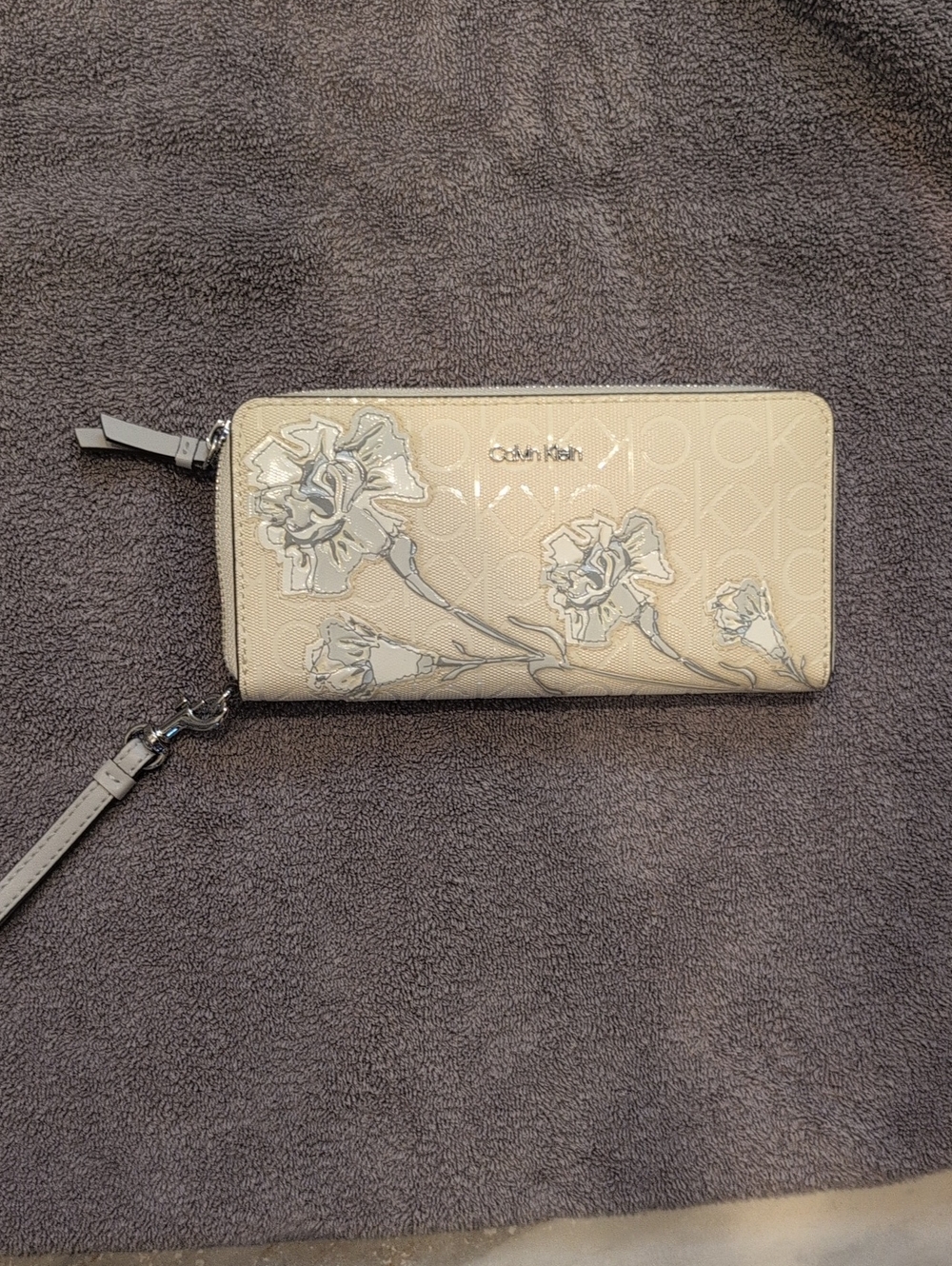 Calvin Klein Cream Floral Zip Wallet with Wrist Strap